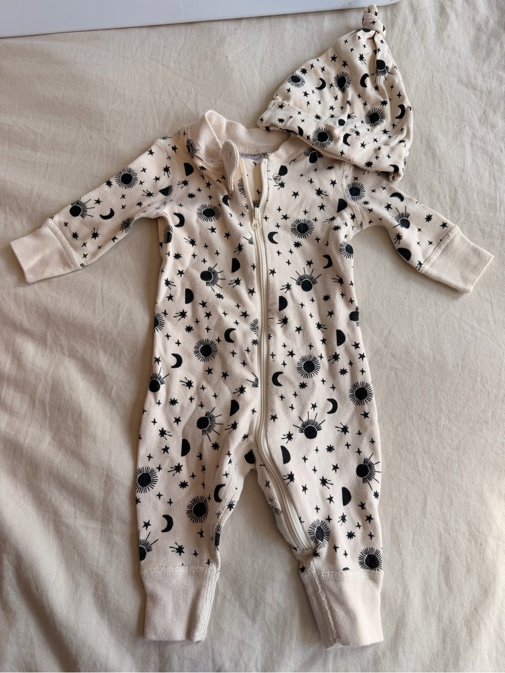 Hanna Andersson Cream One-Piece Footie with Black Celestial Print